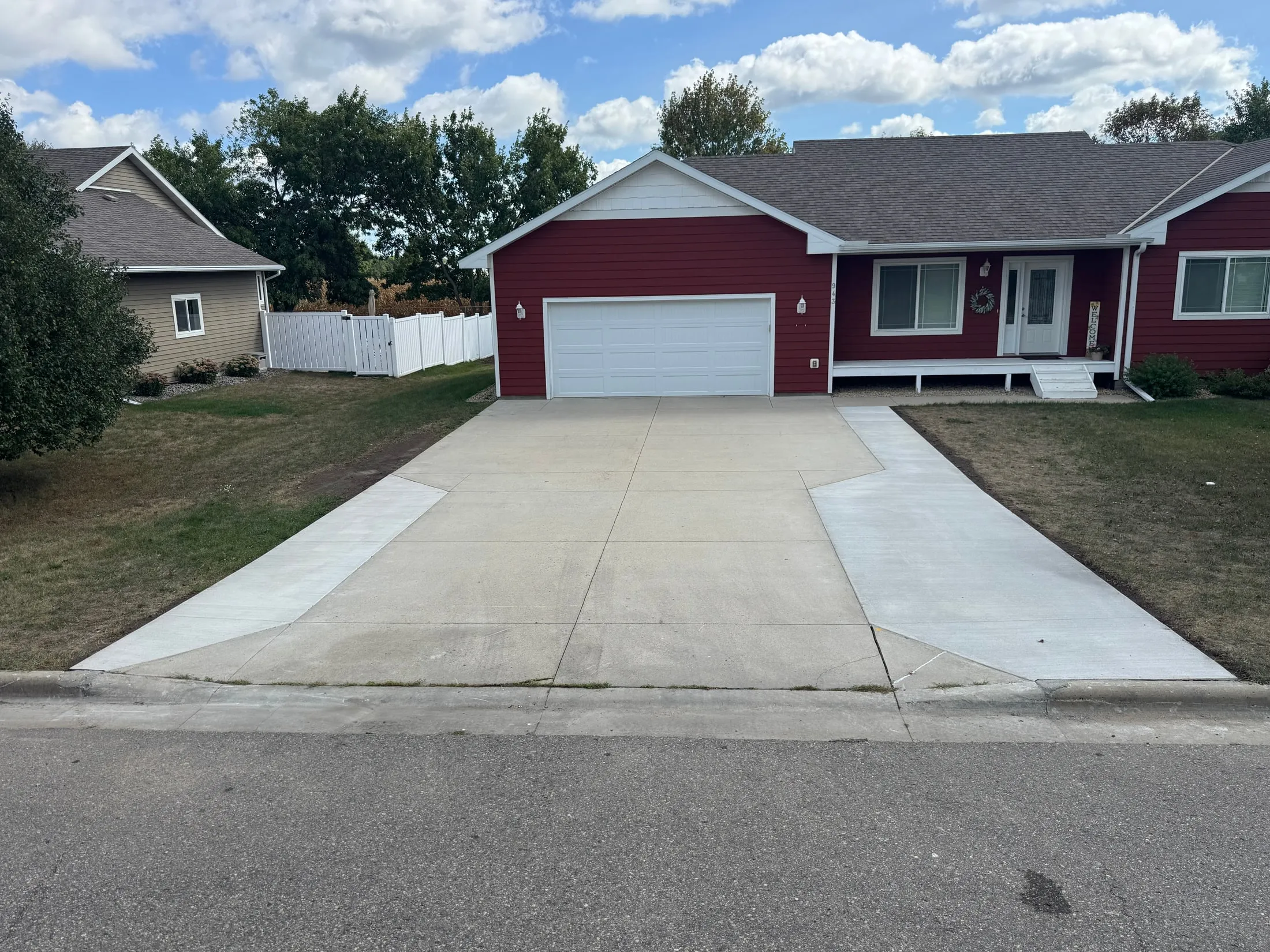 Before: driveway configuration at the red home.