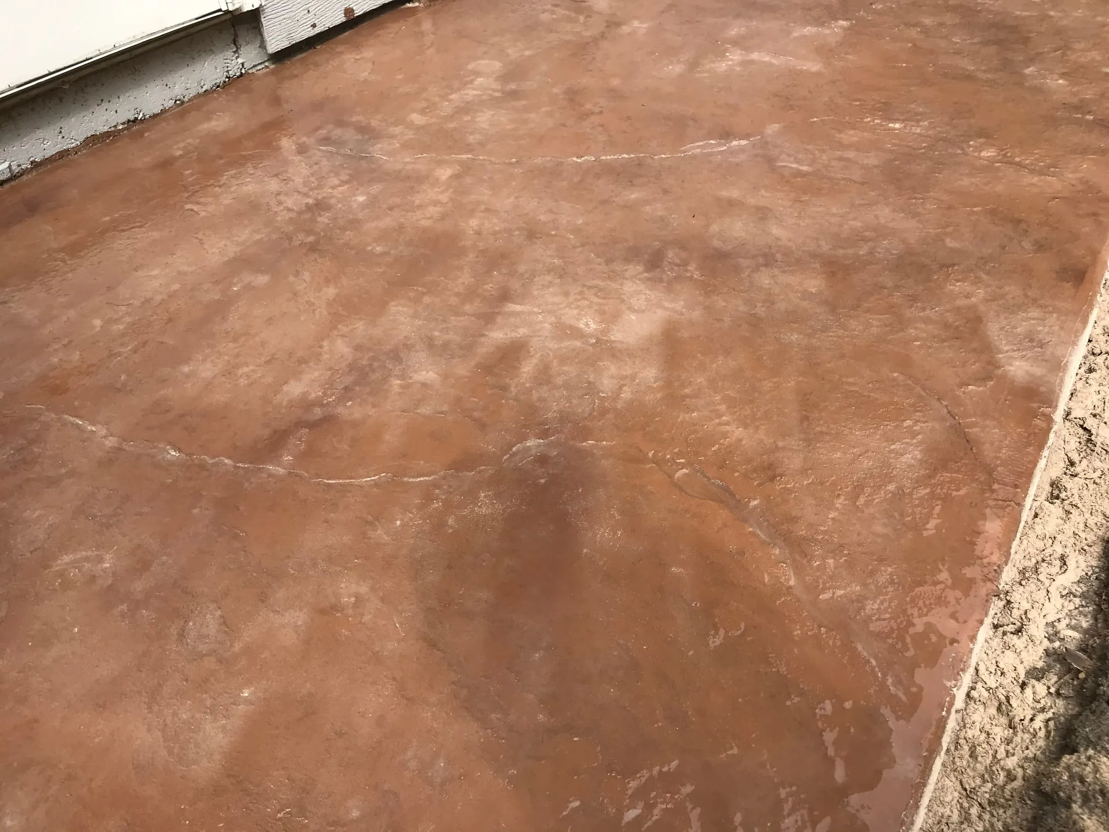 Color-finished entry slab surface after sealing.