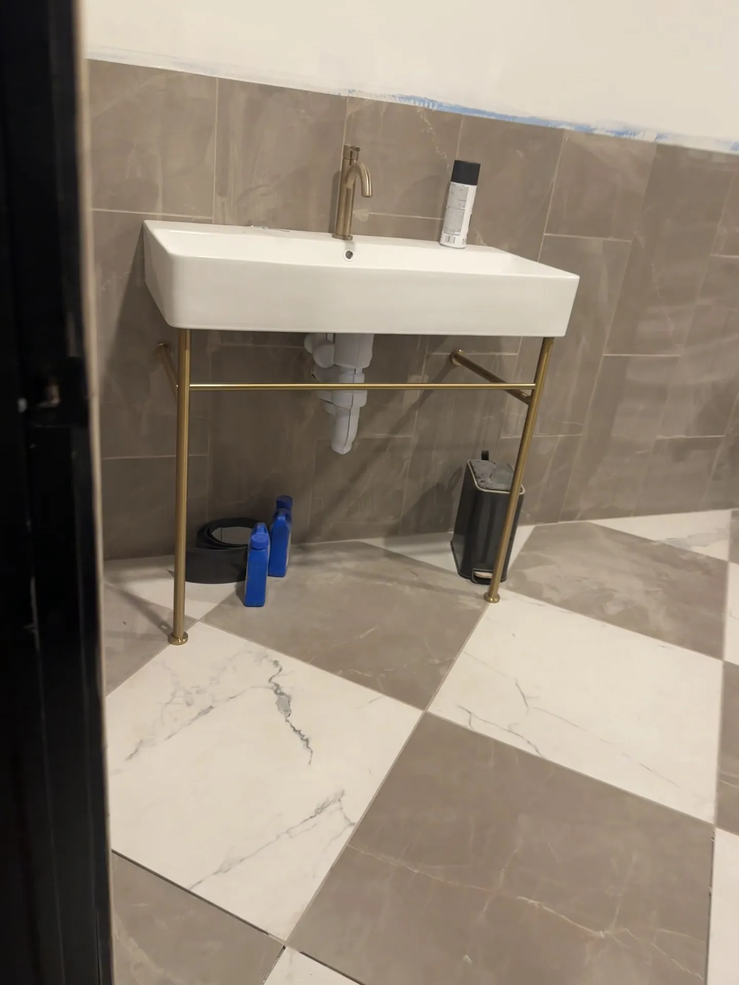 Tile and fixtures at the Tannin & Oak project in Alexandria.